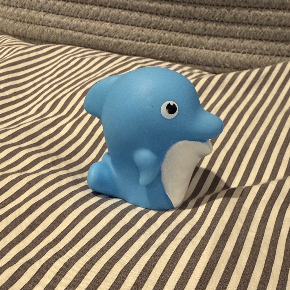 Dolphin finger puppet